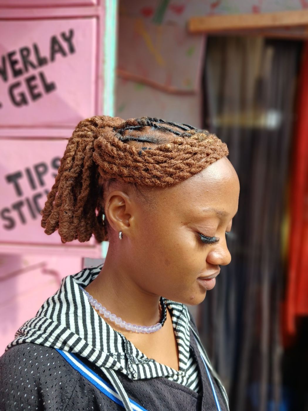 Golden brown loc ponytail